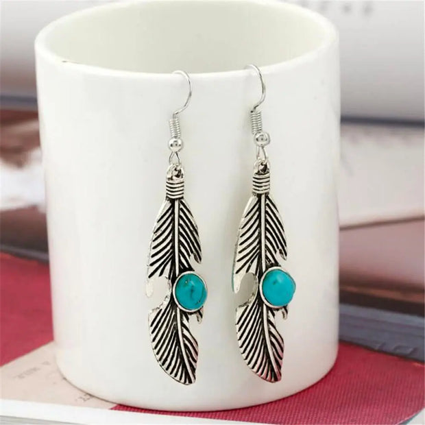 Créoles argentées en pierre turquoise et plumes - Mes Bijoux En Pierres Naturelles