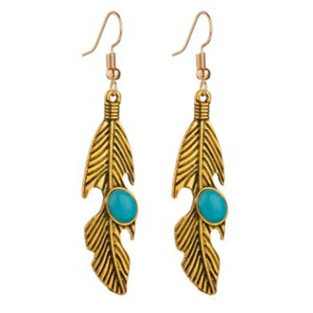 Pendants d'oreilles en turquoise et plume dorée - Mes Bijoux En Pierres Naturelles