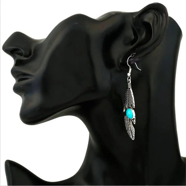 Créoles argentées en pierre turquoise et plumes - Mes Bijoux En Pierres Naturelles