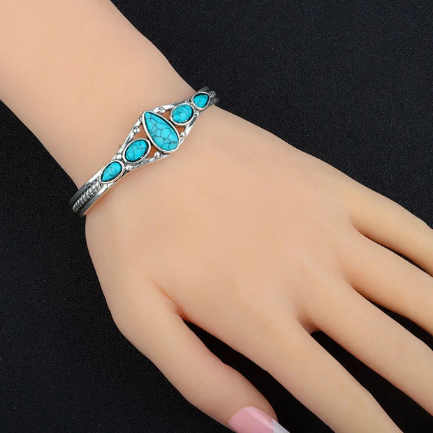 Jonc ajustable orné d'une pierre turquoise ovale - Mes Bijoux En Pierres Naturelles