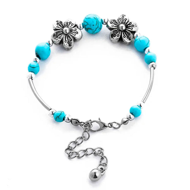 Bijou floral orné de pierre turquoise - Mes Bijoux En Pierres Naturelles